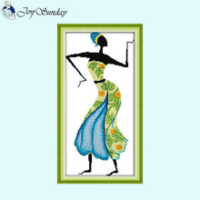 Load image into Gallery viewer, Cross-stitch pattern of a woman in a colorful dress with a green frame on a light blue background.
