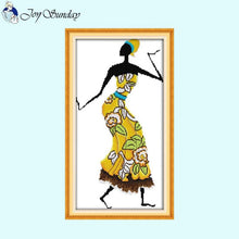 Load image into Gallery viewer, Cross-stitch pattern of a woman in a yellow dress with floral design, framed by 'Joy Sunday'.