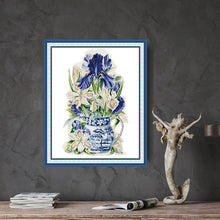 Load image into Gallery viewer, Finished iris and celadon embroidery displayed in elegant home decor setting