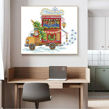 Load image into Gallery viewer, Decorative wall art of a colorful truck with Christmas elements above a home office desk.