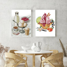 Load image into Gallery viewer, Two framed artworks of ice cream and a table setting on a wall above a dining table.