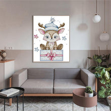 Load image into Gallery viewer, Living room with a gray sofa, small round table, and decorative deer print on the wall.