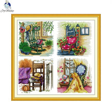 Load image into Gallery viewer, Framed cross-stitch pattern with four scenes of chairs and furniture.