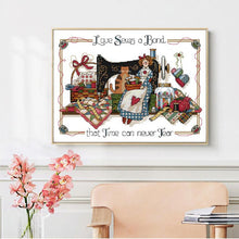 Load image into Gallery viewer, Finished cartoon cross stitch wall art featuring sewing machine and doll