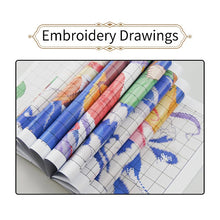 Load image into Gallery viewer, Rolls of embroidery fabric with pre-printed patterns on a white background
