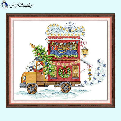 Cross-stitched design of a festive truck with Christmas decorations on a light blue background.