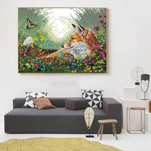 Load image into Gallery viewer, Living room with a fox painting on the wall above a gray sofa.

