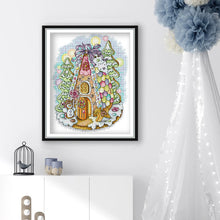Load image into Gallery viewer, Framed gingerbread house cross stitch as holiday wall decor
