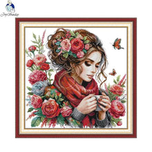 Load image into Gallery viewer, Cross-stitch pattern with a woman holding a cup, surrounded by flowers and butterflies.
