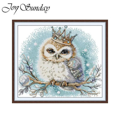 Cross-stitched owl with a crown on a branch, framed with 'Joy Sunday' text.