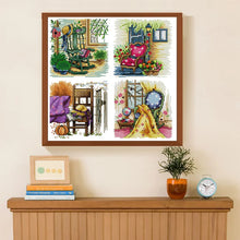 Load image into Gallery viewer, Framed cross-stitch art on a wall above a wooden console table with decorative items.

