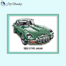 Load image into Gallery viewer, Cross-stitched model of a 1969 E-Type Jaguar on a light blue background with &#39;Joy Sunday&#39; branding.
