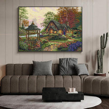 Load image into Gallery viewer, Finished stitched view of the Wishing Cottage scene
